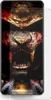 A close-up of a phone screen protector with a dark, graphic image of a lion's head and armor. Produktbild-Vorschau