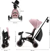 A diagram showing a pink Kinderkraft Jazz 2 trike with various dimensions indicated by measurements and arrows. Voir les images du produit