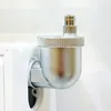 A close-up of a silver radiator air vent valve attached to a white radiator. Anteprima dell’immagine prodotto