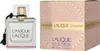 A perfume bottle and its packaging are displayed side-by-side against a white background. Voir les images du produit