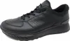 A black leather Ecco Exostride sneaker is shown from a side angle against a white background. Náhled obrázku produktu