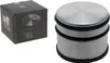 A product shot of a stainless steel door stopper next to its packaging. Náhled obrázku produktu