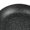 A close-up view of the speckled interior surface of a black frying pan. Náhľad obrázku produktu