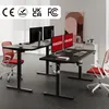Two black standing desks with monitors and chairs in an office setting. Podgląd zdjęcia produktu