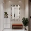 A hallway with a shoe cabinet, a mirror, and a bench. Náhled obrázku produktu