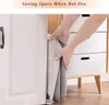 Hands folding a fabric laundry basket to store it. Produktbild-Vorschau
