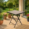 A square folding table is set up on a wooden deck with a garden and house in the background. Anteprima dell’immagine prodotto