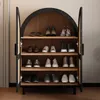 A shoe cabinet with multiple shelves filled with shoes. Produktbild-Vorschau