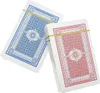 Two decks of playing cards, one blue and one red, are shown side-by-side, held together by rubber bands. Náhled obrázku produktu