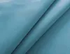 A close-up view of folded blue fabric, likely a curtain or textile. Produktbild-Vorschau