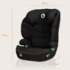 A black car seat with red trim and green accents is shown against a cream background. Dimensions are indicated with text overlays. Produktbild-Vorschau