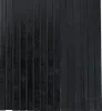 A close-up, full-frame shot of a black wooden screen or partition, showing vertical slats. Voir les images du produit