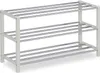 A three-tiered shoe rack made of white-painted metal frames and silver metal rods. Produktbild-Vorschau