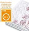 A close-up view of a quilted textile with a floral pattern, alongside a graphic indicating washing instructions. Produktbild-Vorschau