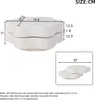 Diagram of a white coffee table with dimensions indicated. Voir les images du produit