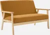 A studio shot of a two-seater sofa with a mustard yellow corduroy fabric and light wood frame. Anteprima dell’immagine prodotto
