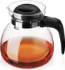 A glass teapot filled with amber liquid. Produktbild-Vorschau