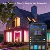 A modern house at night with colorful LED lights illuminating the windows and pathway, controlled by a smartphone app. Anteprima dell’immagine prodotto