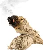 Two bundles of sage are shown, with one bundle smoldering and emitting smoke. Podgląd zdjęcia produktu