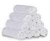 A stack of white rolled-up cloth diapers. Produktbild-Vorschau