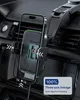 A smartphone car mount with wireless charging capabilities attached to a car's air vent. Podgląd zdjęcia produktu