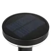 A close-up view of the top of a solar-powered garden light. Produktbild-Vorschau