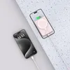 Two smartphones are shown, one charging with a cable, and another with a magnetic power bank attached. Náhled obrázku produktu