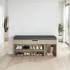 A shoe bench with storage and a padded seat in a hallway. Voir les images du produit
