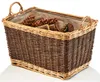 A woven basket filled with pinecones and firewood. Náhľad obrázku produktu