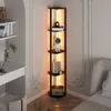 A corner of a room with a floor lamp and shelves. Podgląd zdjęcia produktu
