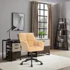 A home office setup with a desk, chair, and bookshelf. Produktbild-Vorschau