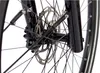 A close-up view of a bicycle's front wheel hub and disc brake. Produktbild-Vorschau