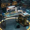 A futuristic gaming setup with an L-shaped desk, multiple monitors, gaming consoles, and accessories. Náhľad obrázku produktu