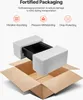 A cardboard box with foam inserts and a black sink basin, illustrating fortified packaging. Produktbild-Vorschau