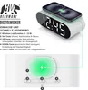 A digital alarm clock with a wireless charging pad on top, displaying the time and featuring instructional text and diagrams. Anteprima dell’immagine prodotto