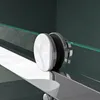A close-up view of a shower door roller mechanism on a glass shower door. Produktbild-Vorschau