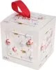 A cube-shaped advent calendar with a red ribbon loop at the top, decorated with Christmas ornaments and snowflakes. Produktbild-Vorschau