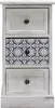 A narrow cabinet with three drawers, one of which has a decorative pattern. Anteprima dell’immagine prodotto