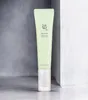 A light green tube of Beauty of Joseon Light On Serum with a clear dispenser is placed on a surface with a gray textured background. Náhľad obrázku produktu