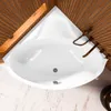 A white corner bathtub with bronze fixtures, set against a wooden slatted wall and marble floor. Produktbild-Vorschau