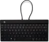 A black split ergonomic keyboard with a black cable is shown against a white background. Produktbild-Vorschau