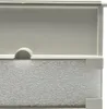 A close-up view of a skimmer flap and filter foam, likely for a swimming pool or pond. Produktbild-Vorschau