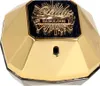A close-up, front-facing view of a gold-colored perfume bottle with faceted sides and a black and gold label. Anteprima dell’immagine prodotto