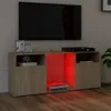 A TV stand with LED lighting and a television on top. Náhled obrázku produktu