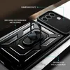 A close-up, angled view of a black smartphone case with a built-in ring holder and camera cover. Produktbild-Vorschau