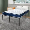 A mattress on a bed frame with two pillows, next to a nightstand, in a room with a window. Náhled obrázku produktu