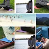 Collage of images showing people using foldable stadium cushions in various outdoor settings like a beach, park, and campsite. Produktbild-Vorschau