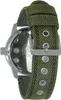 Close-up of the back of a watch with a green fabric strap. Anteprima dell’immagine prodotto
