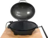 An electric grill with its lid open, placed on a wooden surface. Produktbild-Vorschau