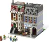 A Lego model of a pet shop and adjacent building with several Lego figures in front. Náhled obrázku produktu